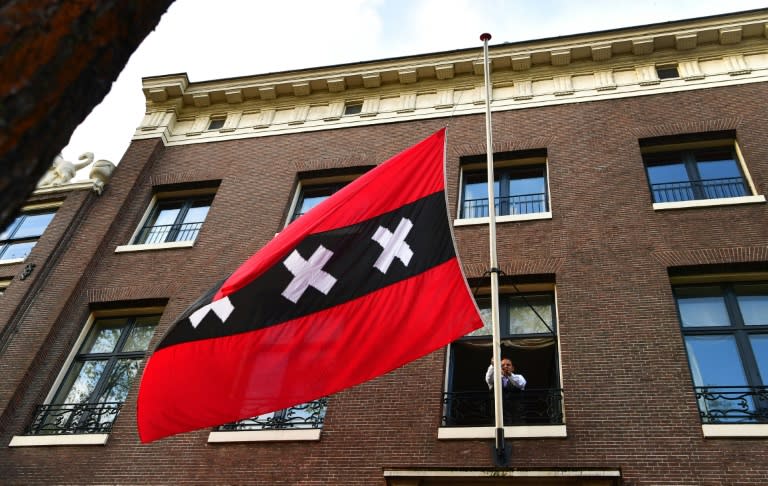 The flag of Amsterdam was flown at half-mast in front of Van der Laan's office on Friday