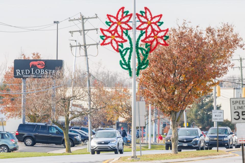 The first new Hanover Christmas decorations in 50 years hang on utility poles, Wednesday, Nov. 15, 2023, on Eisenhower Drive in Hanover Borough.