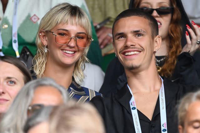 <p>Karwai Tang/WireImage</p> Mia Regan and Romeo Beckham at Wimbledon