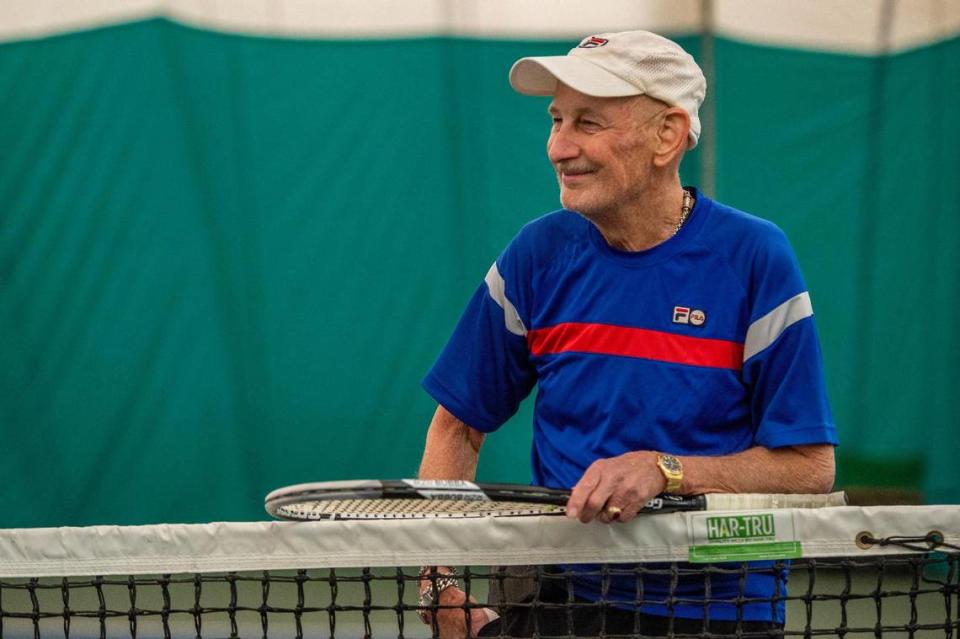 Lake takes a short break at the net between games on a recent Monday at Woodside. 