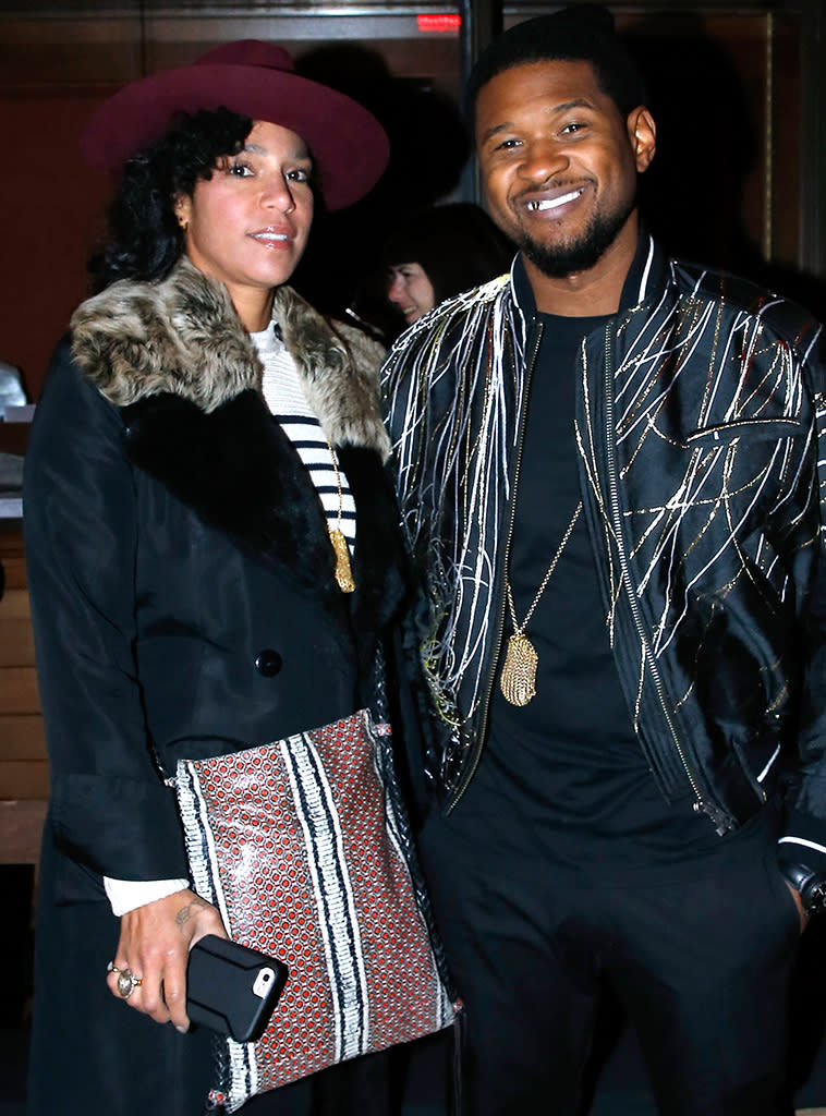 Usher and his wife, Grace Miguel, during&#xa0;Paris Fashion Week on January 18.