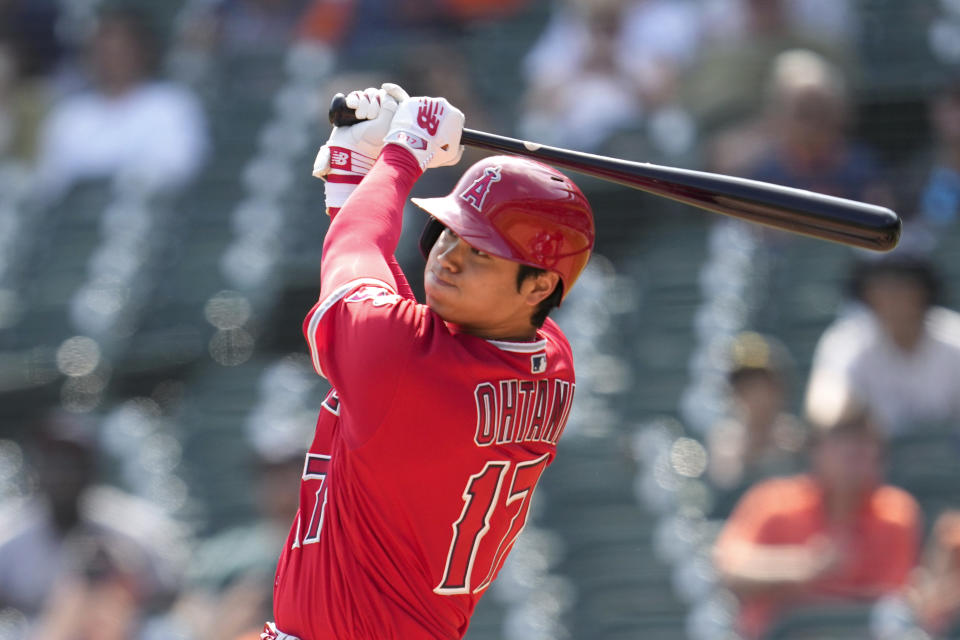 Los Angeles Angels' Shohei Ohtani hits a two-run home run against the Detroit Tigers in the second inning during the second baseball game of a doubleheader, Thursday, July 27, 2023, in Detroit. (AP Photo/Paul Sancya)