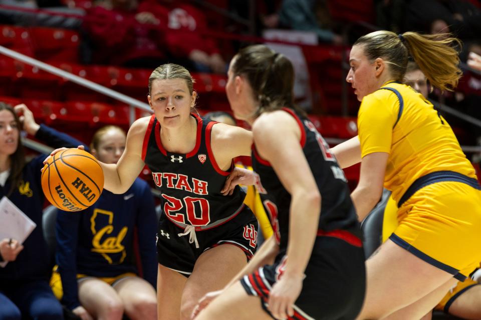 Utah Utes forward Reese Ross (20) drives the ball past Utah guard Kennady McQueen (24) and University of California’s forward Marta Suárez (7) at University of Utah’s Huntsman Center in Salt Lake City on Jan. 14, 2024. University of Utah won 93-56. | Marielle Scott, Deseret News