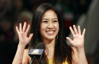 <p>Former figure skater Michelle Kwan waves at an on-ice recognition for her Hall of Fame induction at the U.S. Figure Skating Championships in San Jose, Calif., Saturday, Jan. 28, 2012. (AP Photo/Jeff Chiu) </p>