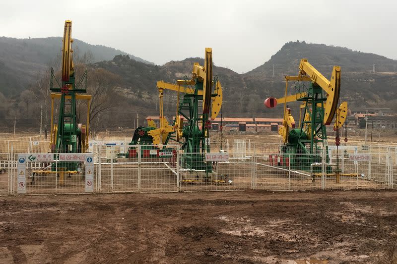 FILE PHOTO: Gas is extracted from a coalbed methane well in Jincheng