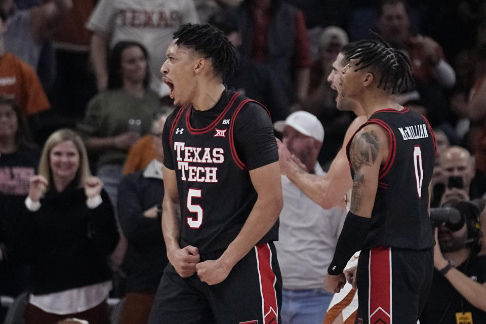 Texas Tech guards Darrion Williams (5) and Chance McMillian (0) celebrate after a score against Texas during the second half of an NCAA college basketball game in Austin, Texas, Saturday, Jan. 6, 2024. (AP Photo/Eric Gay)