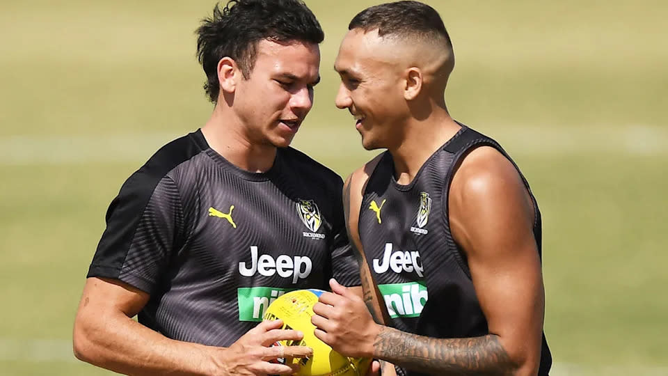 Pictured here, Richmond teammates Daniel Rioli and Shai Bolton (right) at training.