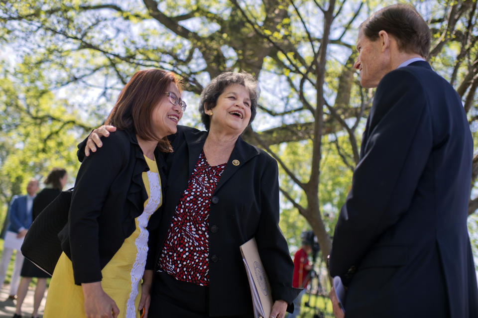 From left, Shandra Woworuntu, a survivor of sex-trafficking, Rep. Lois Frankel (D-Fla.) and Sen. Richard Blumenthal (D-Conn.) prepare for a news conference to announce Visa Transparency Anti-Trafficking Act on the East Front of the Capitol on April 20, 2016.