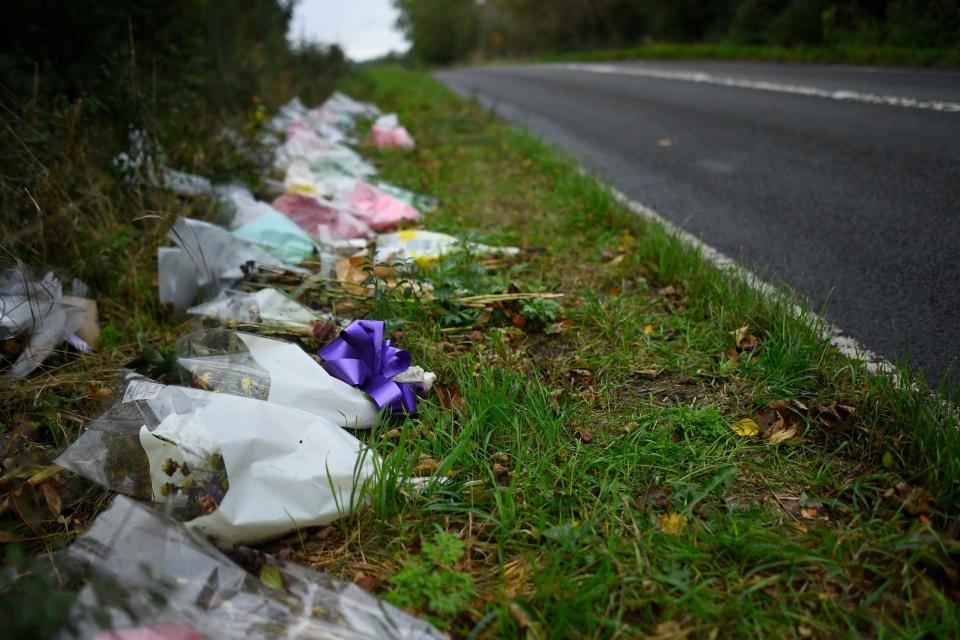 Tributes: flowers left at the scene of the crash (Getty Images)