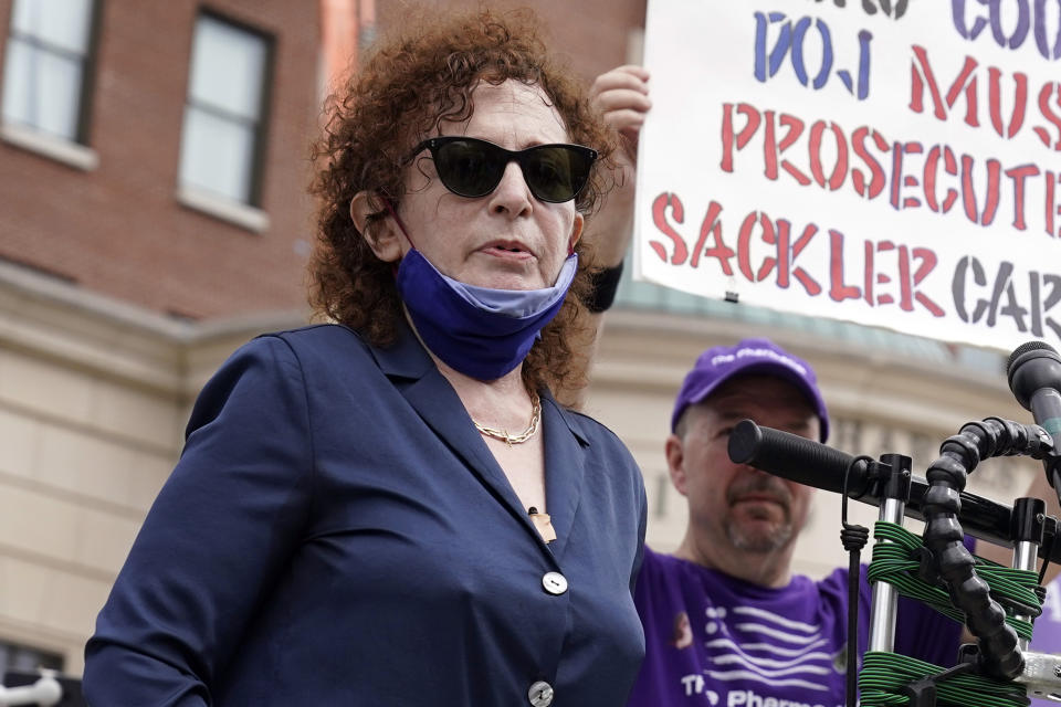 FILE — Photographer and activist Nan Goldin speaks during a protest in front of the courthouse where the Purdue Pharma bankruptcy is taking place, in White Plains, N.Y., on Aug. 9, 2021. Goldin is the subject of the documentary "All the Beauty and the Bloodshed." (AP Photo/Seth Wenig, File)
