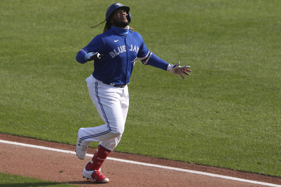 Toronto Blue Jays Vladimir Guerrero Jr. celebrates his home run against Baltimore Orioles pitcher Keegan Akin during the third inning of a baseball game, Sunday, Sept. 27, 2020, in Buffalo, N.Y. (AP Photo/Jeffrey T. Barnes)