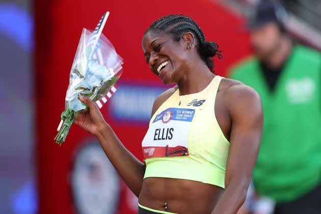 Kendall Ellis reacts after winning the women's 400 meter final.