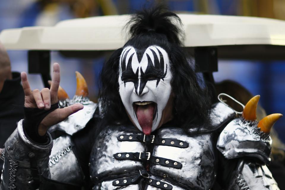 Gene Simmons of KISS gestures as he attends the 88th Macy's Thanksgiving Day Parade in New York November 27, 2014. REUTERS/Eduardo Munoz (UNITED STATES - Tags: SOCIETY ENTERTAINMENT)