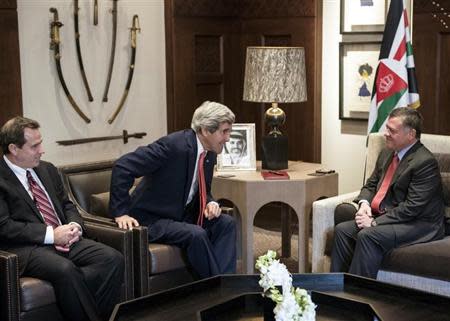 U.S. ambassador to Jordan Stuart E. Jones watches as U.S. Secretary of State John Kerry meets with Jordan's King Abdullah (L-R) at Al-Hummar Palace in Amman January 5, 2014. REUTERS/Brendan Smialowski/Pool