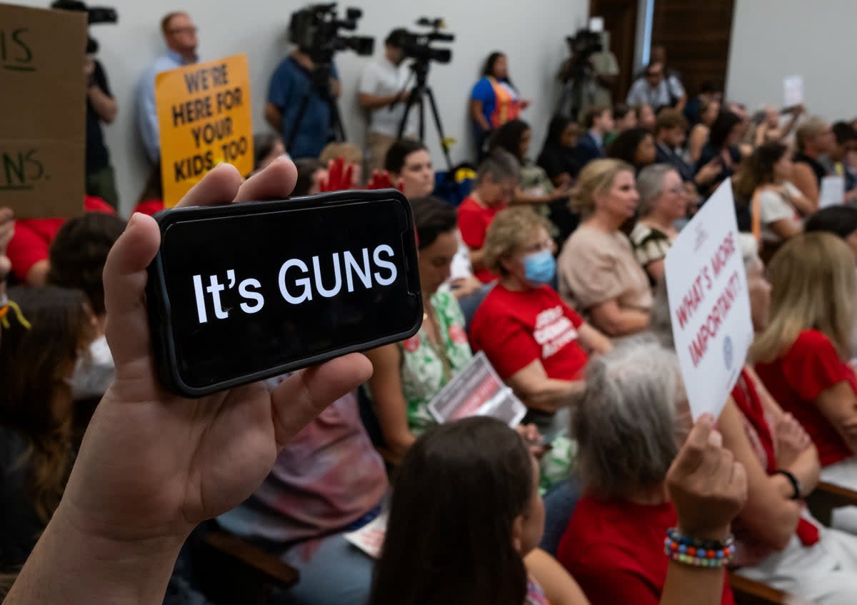 A supporter of gun reform holds their  phone up during  special state legislative session on gun violence in Tennesseee in August.  (REUTERS)