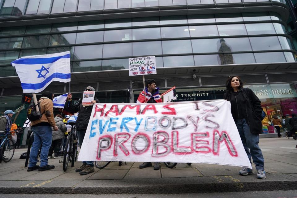 People at a counter-protest to the pro-Palestine marches, in Victoria, central London (Jordan Pettitt/PA) (PA Wire)