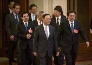 Chinese government officials arrive for the opening ceremony of the Asian Infrastructure Investment Bank (AIIB) in Beijing, China, January 16, 2016. REUTERS/Mark Schiefelbein/Pool