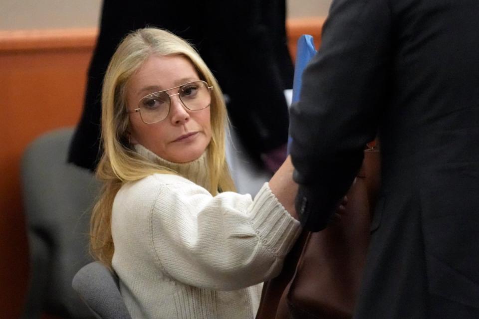 Paltrow wore a cream-coloured turtleneck and 70s aviator glasses on her first day in court (AP)