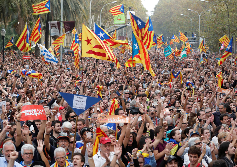 People celebrate in Barcelona after the Catalan regional Parliament there voted for independence from Spain on Friday. (Photo: Yves Herman / Reuters)