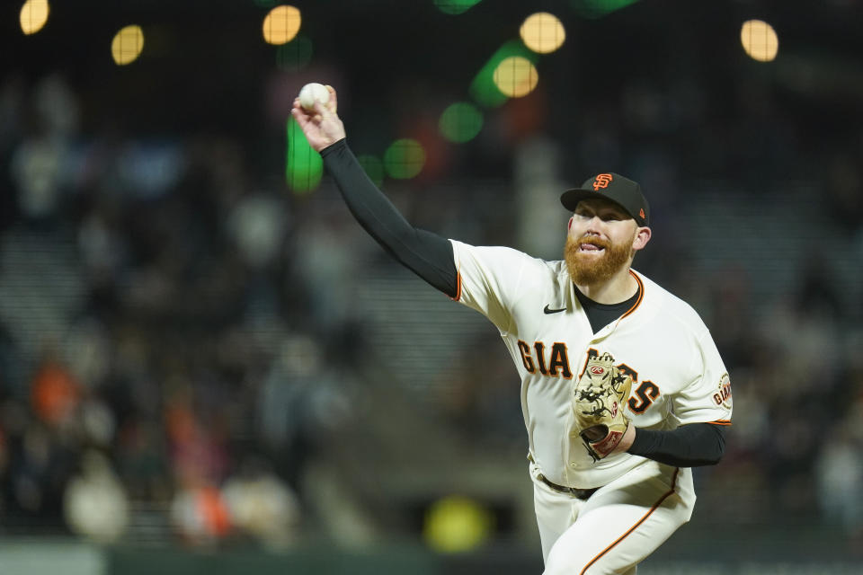 San Francisco Giants' Zack Littell pitches against the Atlanta Braves during the eighth inning of a baseball game in San Francisco, Monday, Sept. 12, 2022. (AP Photo/Godofredo A. Vásquez)