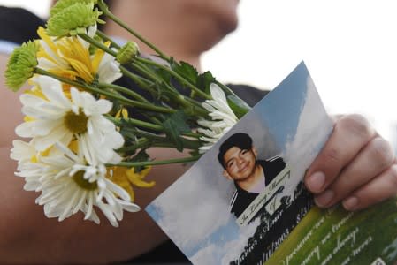 People pay their respects two days after a mass shooting in El Paso