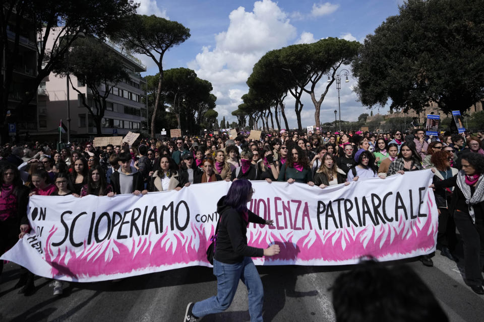 A banner reading in Italian "We strike against patriarchal violence" is shown during a march on the occasion of International Women's Day, in Rome, Friday, March 8, 2024. Marches, demonstrations and conferences are being held the world over, from Asia to Latin America and elsewhere to mark International Women's Day. (AP Photo/Alessandra Tarantino)