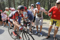 <p>FILE- In this file photo dated Saturday, July 18, 2015, Tejay van Garderen of the U.S. climbs during the fourteenth stage of the Tour de France cycling race over 178.5 kilometers (110.9 miles) with start in Rodez and finish in Mende, France, Saturday, July 18, 2015. Tejay van Garderen is a top contenders for overall victory in the upcoming 103rd Tour de France, which starts Saturday July 2, 2016, at Mont-Saint-Michel, France. (AP Photo/Laurent Cipriani, FILE)</p>