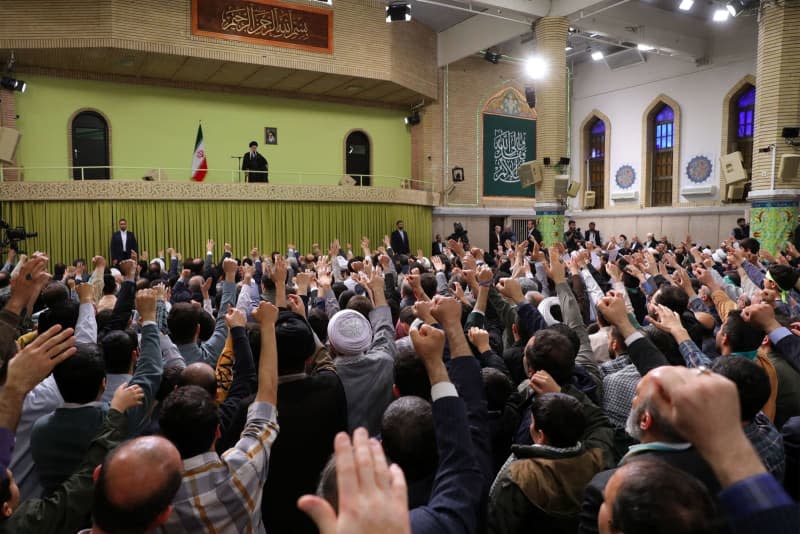 Iranian Supreme Leader Ayatollah Ali Khamenei look on as people greet him ahead of his annual speech to mark Persian New Year (Nowruz). -/Iranian Supreme Leader's Office/dpa