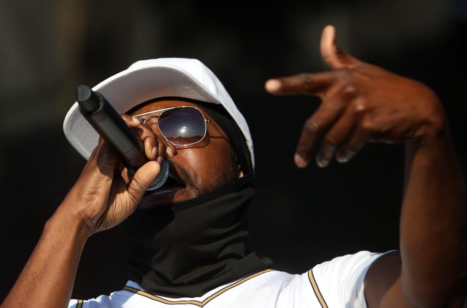 Al Kapone and his band perform during the Beale Street Music Fest's opening night at Liberty Bowl Park on Friday, April 29, 2022. 