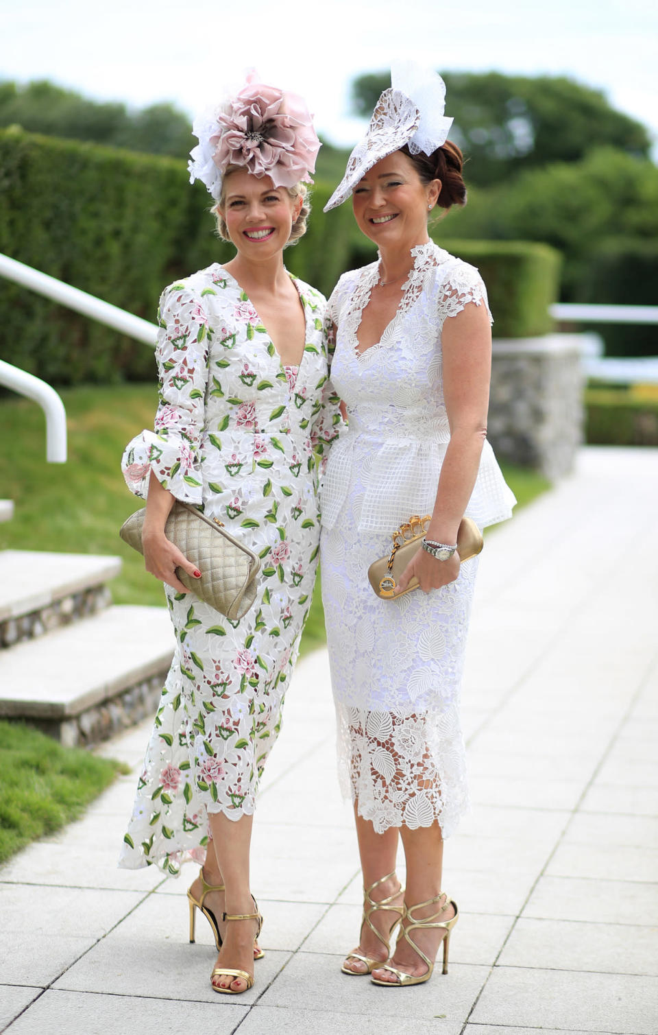 This duo looked lovely in lace: One lady opted for a floral print while the other a crisp, white midi number. 