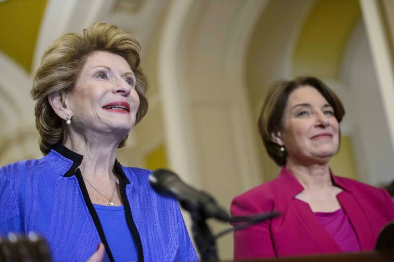 Sen. Debbie Stabenow (L), D-Mich., speaks as Sen. Amy Klobuchar, D-Minn. , looks on during a January 2023 press conference at the U.S. Capitol in Washington, D.C. Stabenow joined her state's fellow Democratic senate colleague, as well as Indiana's two Republican senators, in calling for the Justice Department and Federal Trade Commission to investigate F1 racing. File Photo by Bonnie Cash/UPI