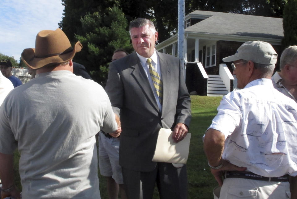 Republican 1st Congressional District candidate Brendan Doherty greets supporters in Tiverton, R.I., Thursday, Sept. 6, 2012, before speaking at a news conference where he said he wanted the federal government to intervene to stop the state from imposing tolls on the new Sakonnet River Bridge. (AP Photo/Michelle R. Smith)