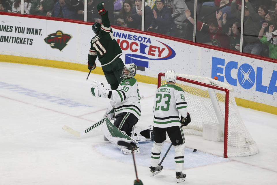 Minnesota Wild's Zach Parise celebrates after scoring a goal against Dallas Stars goalie Ben Bishop during the third period of an NHL hockey game Saturday, Jan. 18, 2020, in St. Paul, Minn. Minnesota won 7-0. (AP Photo/Stacy Bengs)