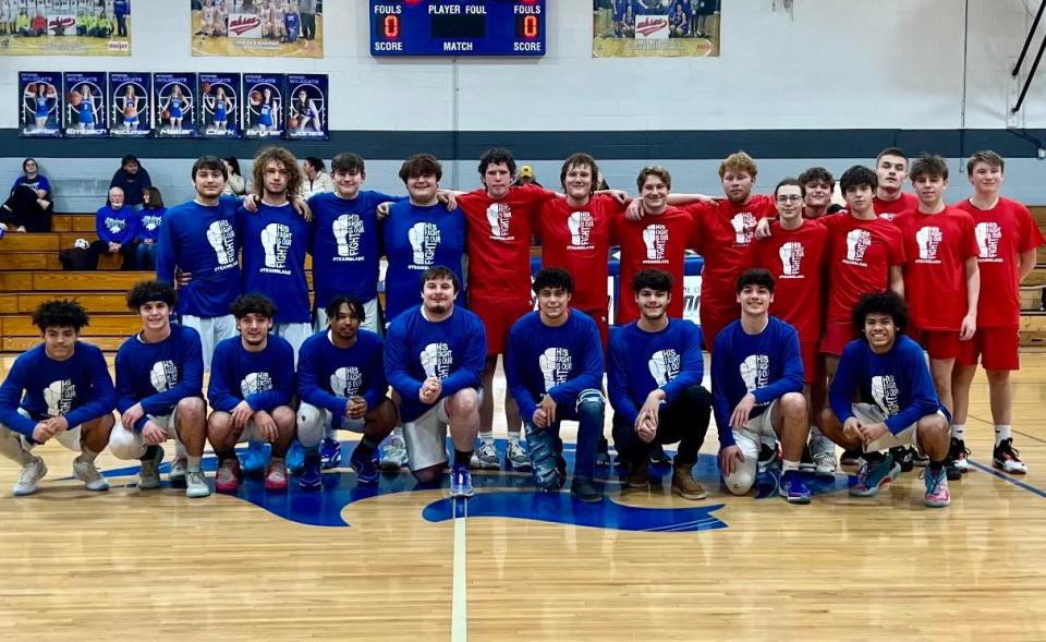 Pittsford boys basketball players were joined by the Tekonsha to support Pittsford graduate Blade Gore in his battle with Langerhans Cell Histiocytosis. They wore Team Blade Gore warmups before the game.