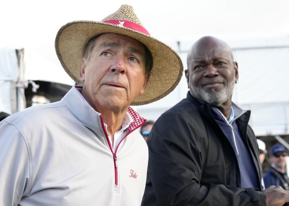 Former Alabama head coach Nick Saban and NFL legend Emmitt Smith watch a tee shot on the 10th hole during the Annexus Pro-Am at the WM Phoenix Open at TPC Scottsdale on Feb. 7, 2024.