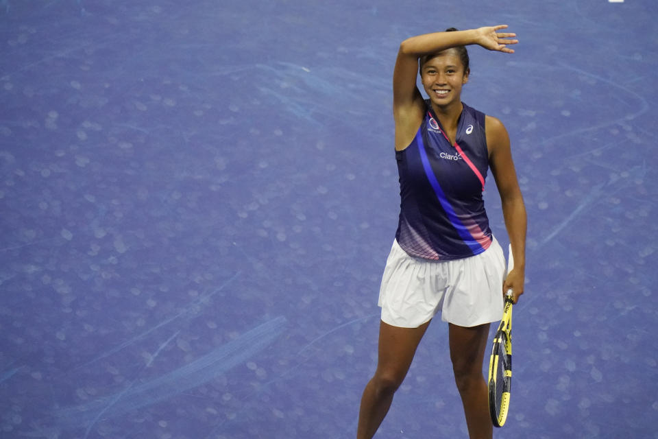 Leylah Fernandez, of Canada, reacts after defeating Naomi Osaka, of Japan, during the third round of the US Open tennis championships, Friday, Sept. 3, 2021, in New York. (AP Photo/Frank Franklin II)