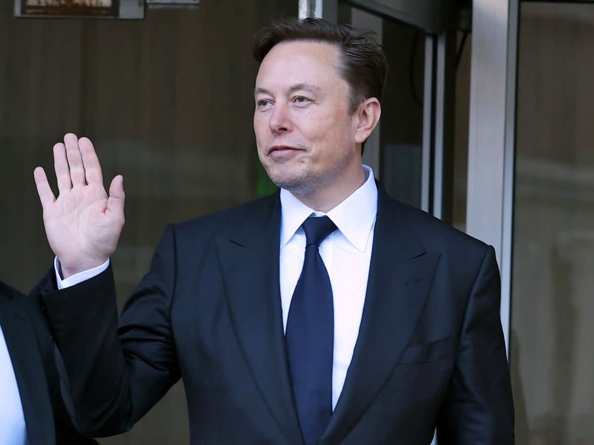 Tesla CEO Elon Musk leaves the Phillip Burton Federal Building on 24 January, 2023 in San Francisco, California. - An event in Flushing, New York invited a Musk impersonator and the organiser has been accused of lying  (Getty Images)