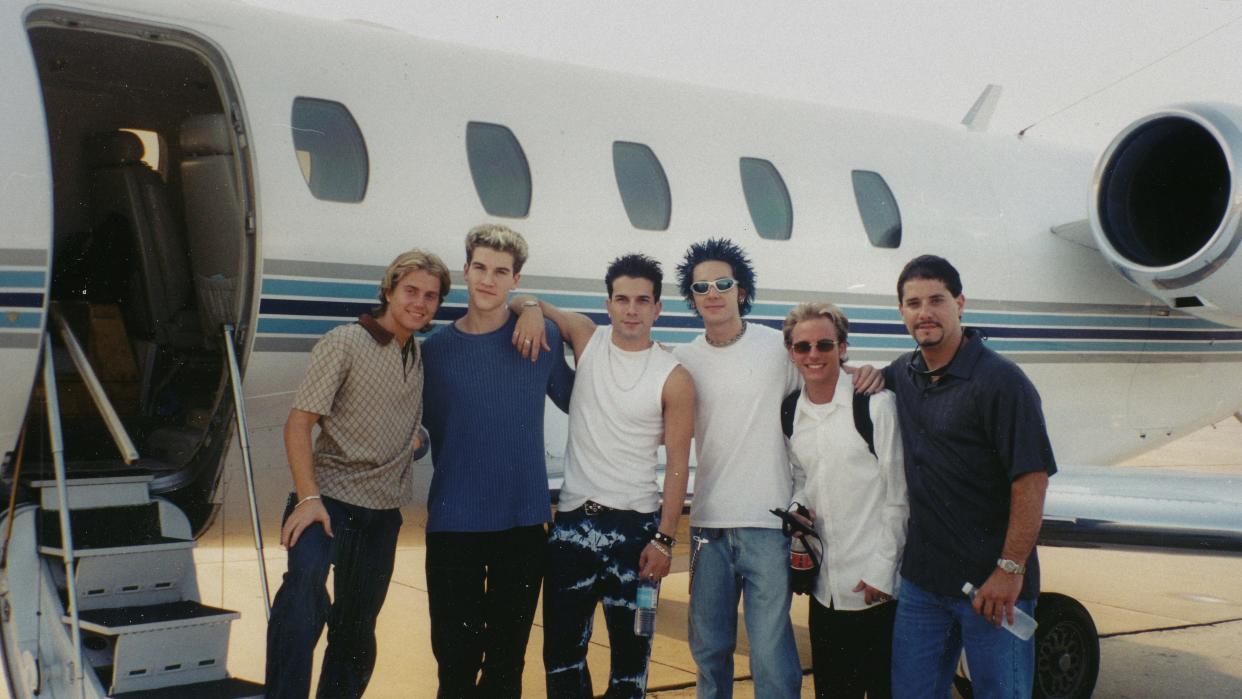 The members of Natural pose in front of a private plan. From left, Patrick King, Ben Bledsoe, Marc Terenzi, Michael Johnson and J Horn, with Marc Piacenza.