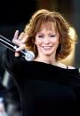 <p>Nope, we’re not talking basketball. Reba's trendy gold hoops at her 2004 <em>Today</em> performance scored all the points in our books.</p>
