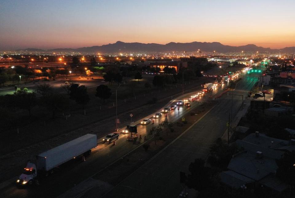 Vehicles line up to cross the US-Mexico border in El Paso, Texas, on 18 November.
