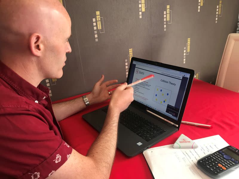 Chris McGillicuddy from EB Education Services hosts an online tutoring session during the coronavirus disease (COVID-19) outbreak in Manchester