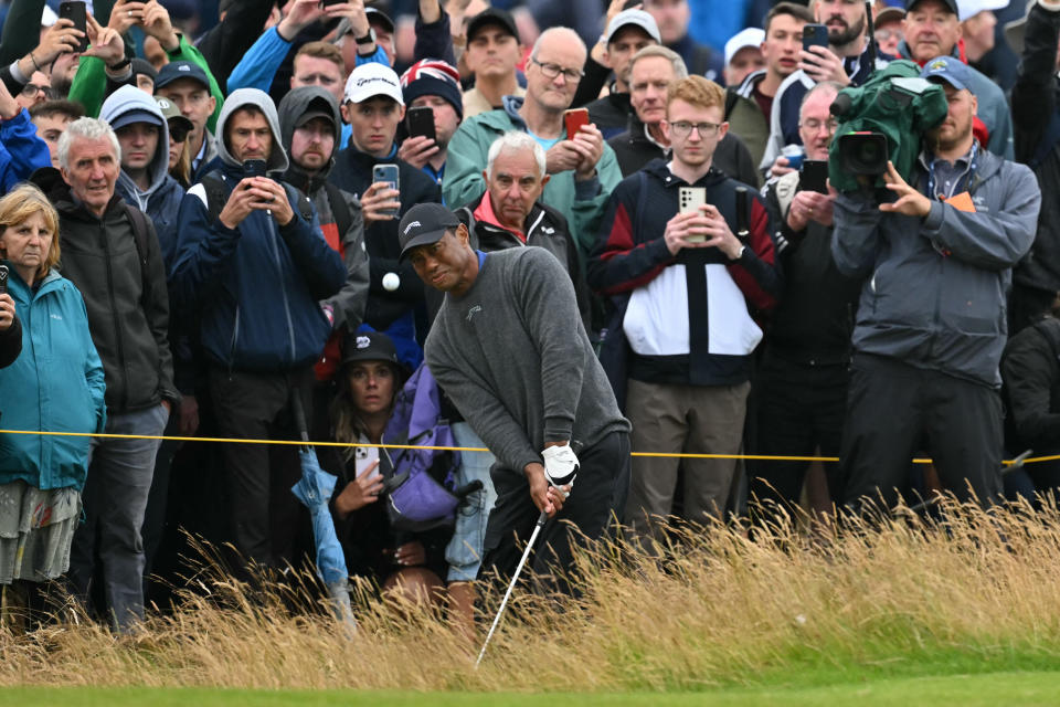 The galleries around Tiger Woods are always watching. (Glyn KIRK / AFP)