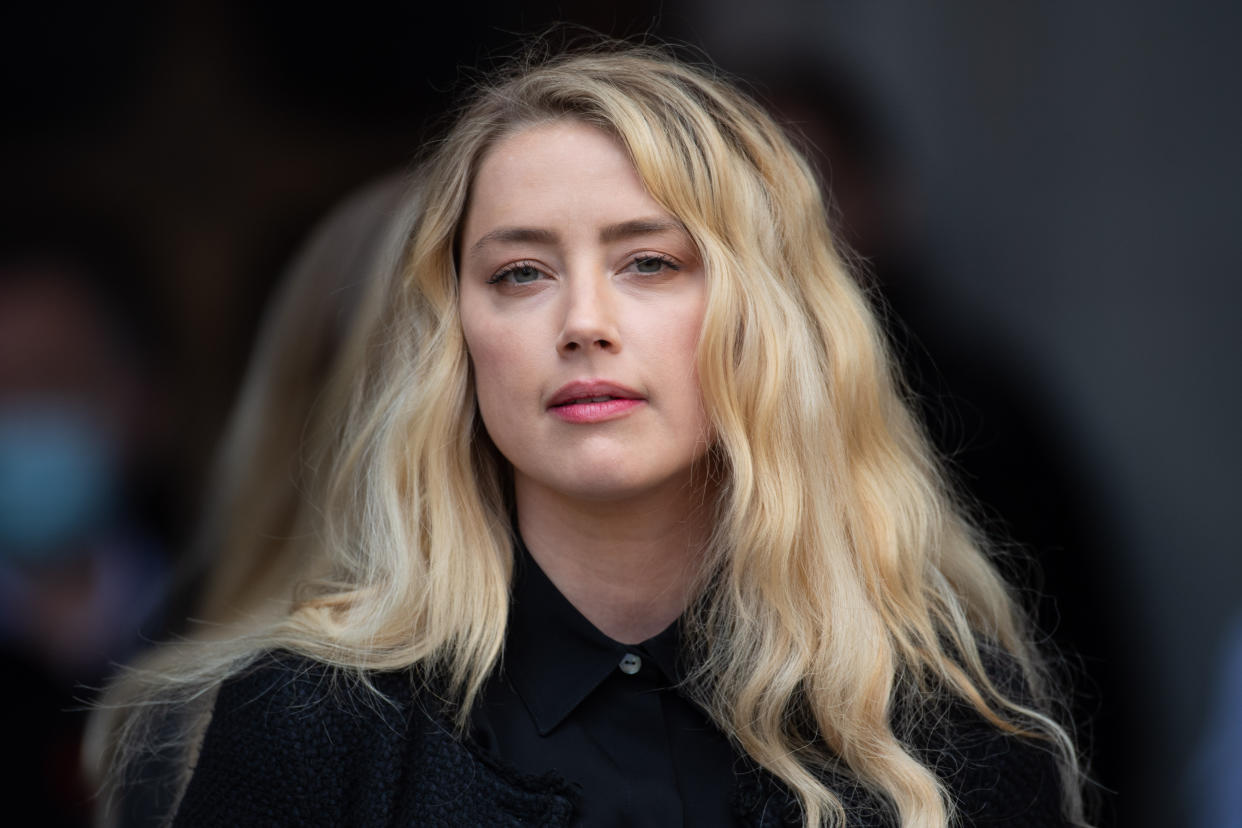 Actress Amber Heard gives a statement outside the High Court in London on the final day of hearings in Johnny Depp's libel case against the publishers of The Sun and its executive editor, Dan Wootton. Picture date: Tuesday July 28, 2020. Photo credit should read: Matt Crossick/Empics