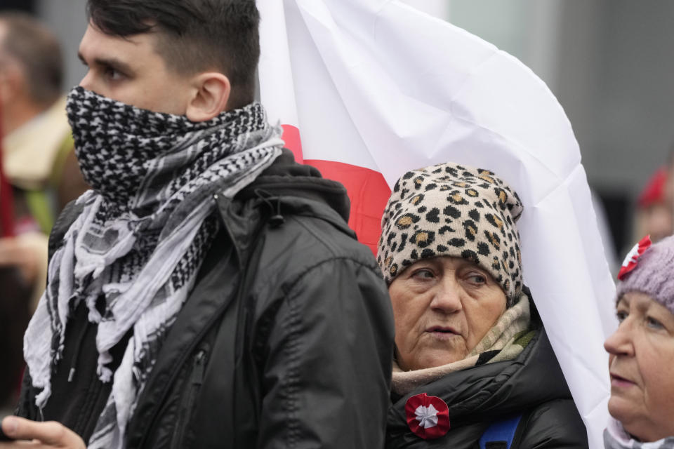 People take part in a yearly march on Poland's Independence Day holiday in Warsaw, Poland, on Saturday, Nov. 11, 2023. The Independence Day holiday celebrates the restoration of Poland's national sovereignty in 1918, at the end of World War I and after 123 years of foreign rule. (AP Photo/Czarek Sokolowski)