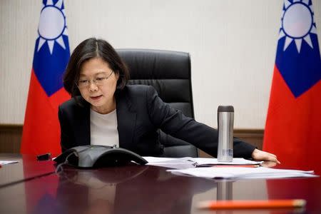 Taiwan's President Tsai Ing-wen speaks on the phone with U.S. president-elect Donald Trump at her office in Taipei, Taiwan, in this handout photo made available December 3, 2016. Taiwan Presidential Office/Handout via REUTERS/File Photo