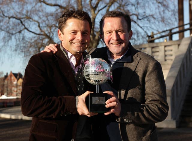 John Hollins with son Chris (left), the 2009 winner of Strictly Come Dancing