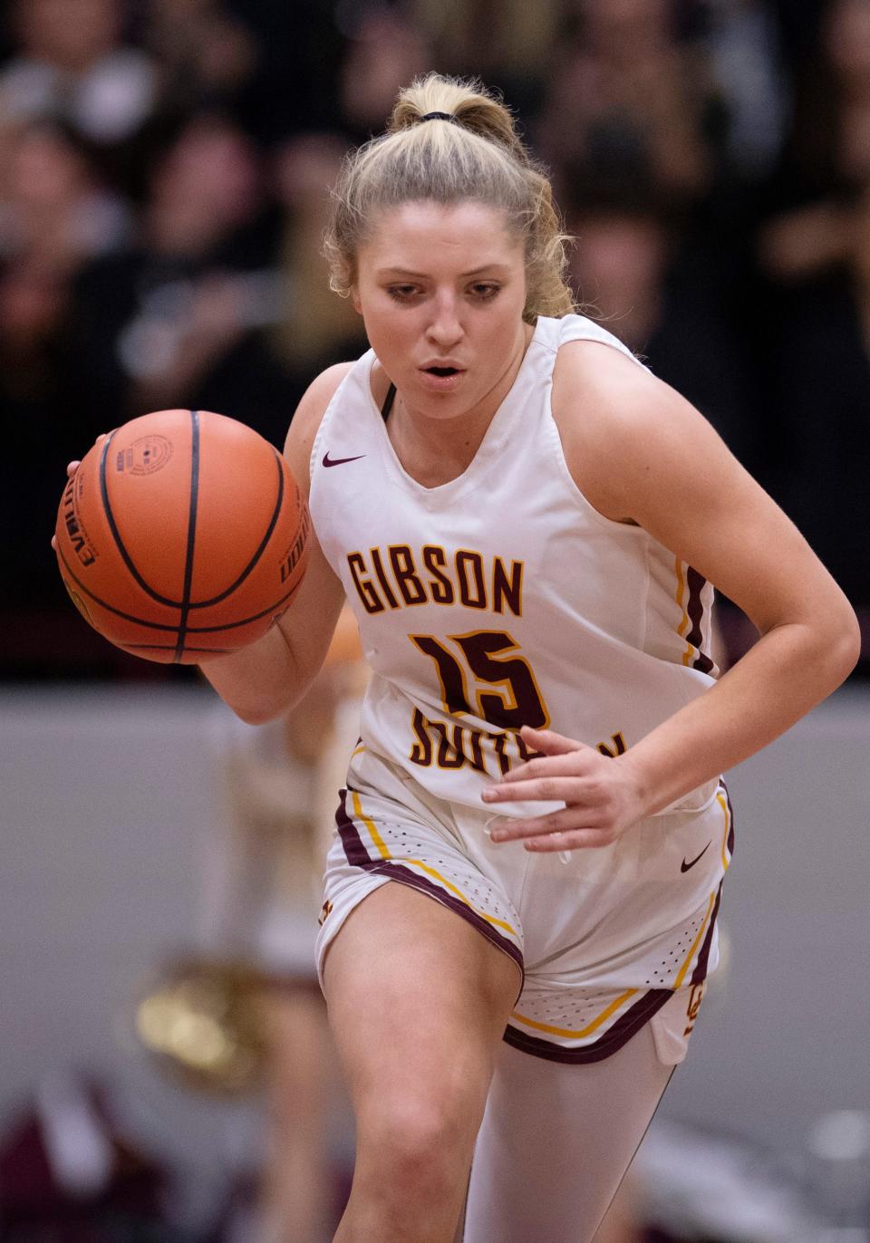 Gibson Southern's Gabby Spink (15) brings the ball up the court against Memorial during their Class 3A sectional championship game at Mount Vernon High School Monday night, Feb. 6, 2023.