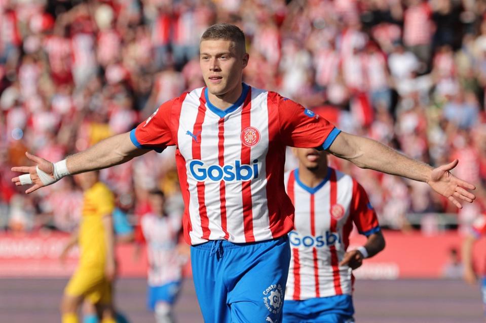 Girona's Artem Dovbyk celebrates scoring an equalizing goal during the Spanish league football match between Girona FC and FC Barcelona at the Montilivi stadium in Girona on May 4, 2024. (Photo by LLUIS GENE/AFP via Getty Images)