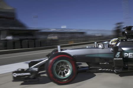 Formula One F1 - U.S. Grand Prix - Circuit of the Americas, Austin, Texas, U.S., 22/10/16. Mercedes' Lewis Hamilton of Britain leaves the garage area as he participates in the third practice session. REUTERS/Adrees Latif