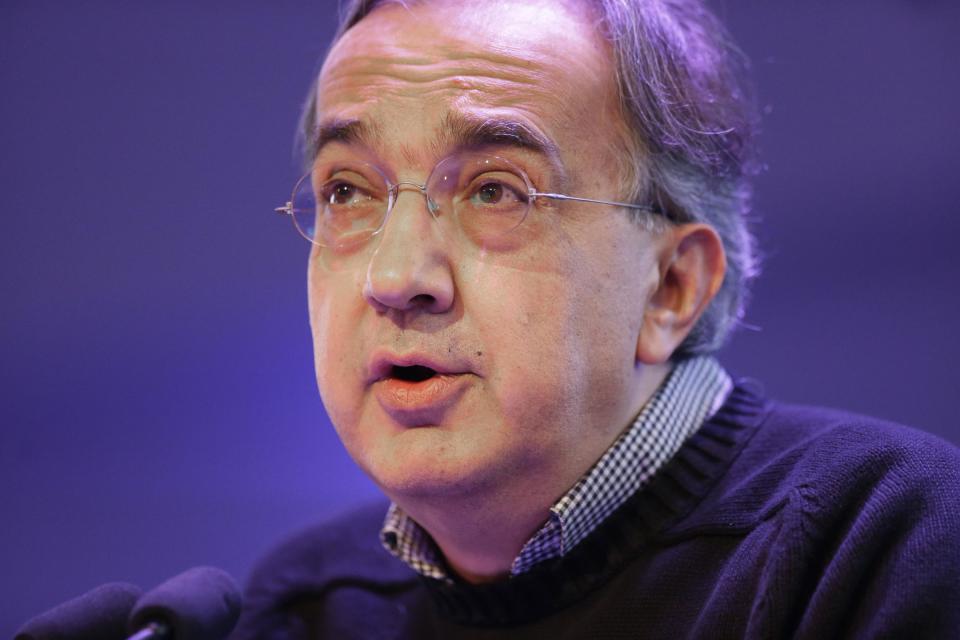 Chrysler Group LLC Chairman and CEO Sergio Marchionne speaks to investors at the automaker's world headquarters in Auburn Hills, Mich., Tuesday, May 6, 2014. Fiat Chrysler Automobiles NV unveiled its business strategy for the next five years as it prepares for life as a newly merged company. (AP Photo/Carlos Osorio)